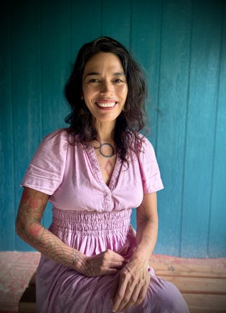 smiling headshot of Ixchel Xochitlzihuatl, sexologist and healer in Hawaii