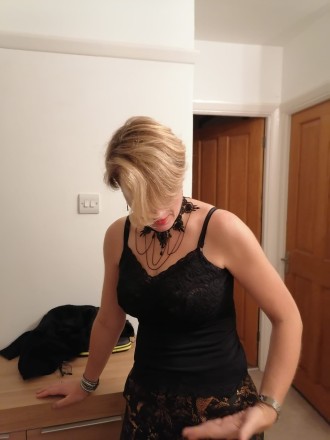 Universal Sensual Massage: Jay, black dress portrait shot