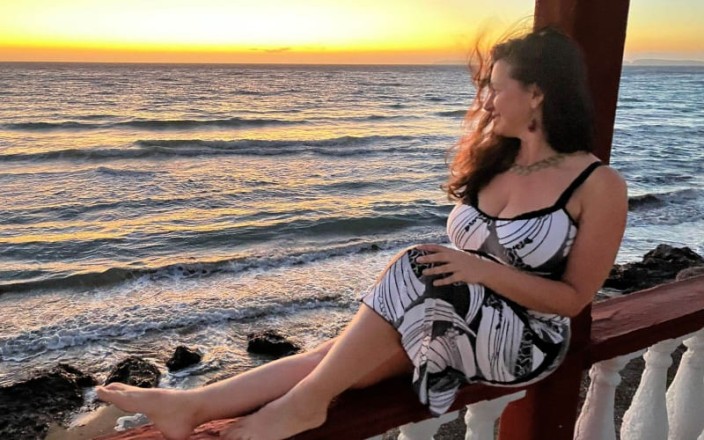 A complete guide to Bristol's tantra massage scene, Madeline sunset sea portrait shot